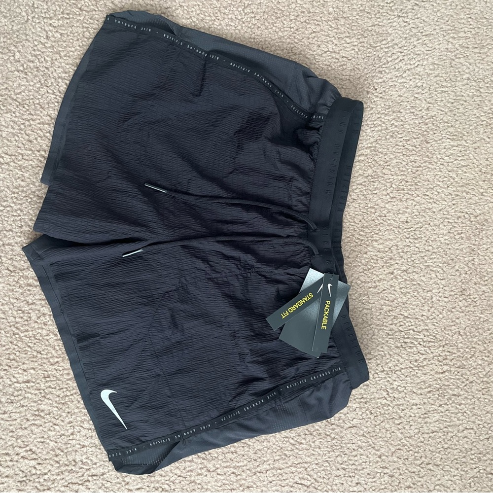NWT NIKE running division shorts